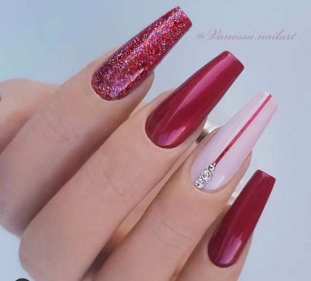 red sleek stiletto holiday nails